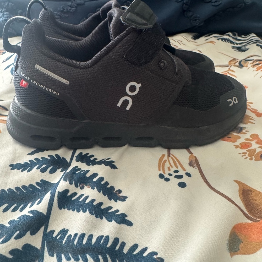 On Running Black Sneakers with CloudTec Technology